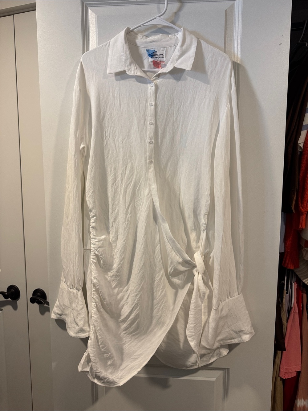 White Long-Sleeve Button Front Knot Tunic Dress by SNDYS.